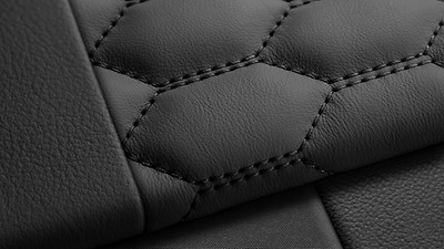 Fine Nappa leather seating with honeycomb stitching and RS embossing