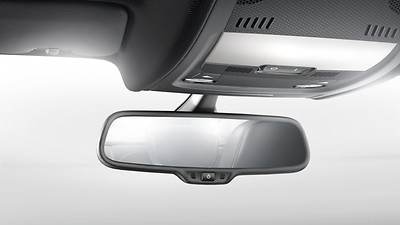 Automatic dimming interior mirror with compass and integrated toll module