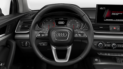 Heated three-spoke multifunction steering wheel with shift paddles