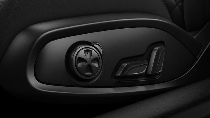 Electrically adjustable front seats with pneumatic side bolsters