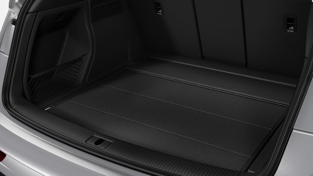 Variably folding luggage compartment mat