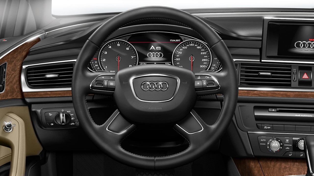 4-spoke leather-trimmed multi-function steering wheel
