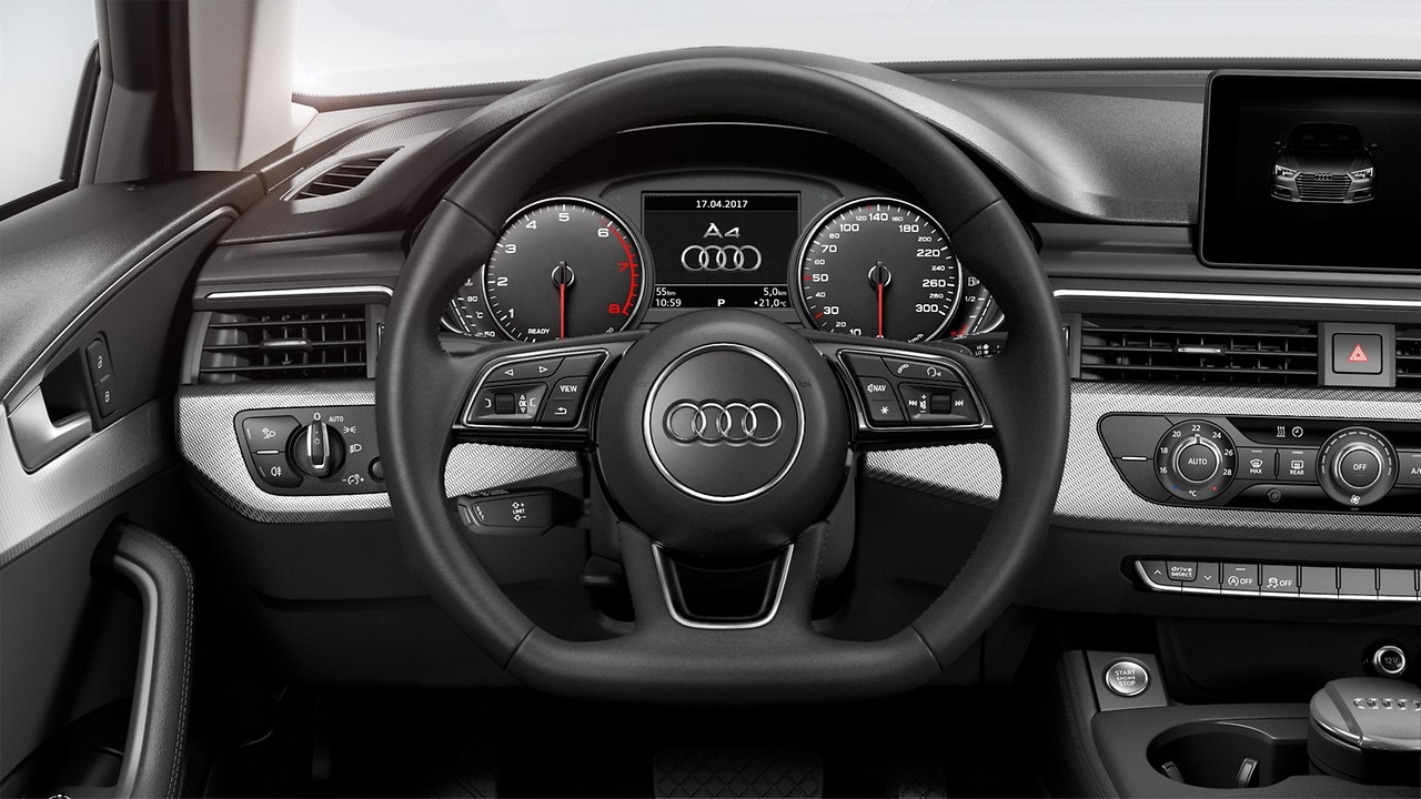 Flat bottomed 3-spoke leather trimmed high multi-function steering wheel with chrome clip (and paddles for automatic transmissions)